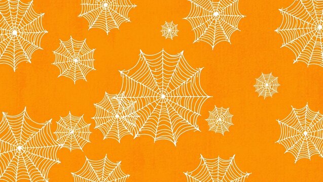 Seamless pattern of golden spider webs on a bright orange background for halloween design