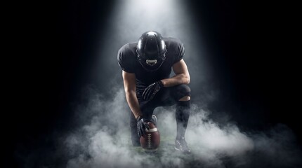 Obraz premium Intense American football player in action pose with dramatic stadium lighting