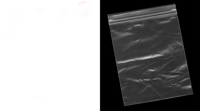 Transparent plastic ziplock bag on black background. Empty polyethylene baggie with zip lock seal. Clear poly bag for packaging.