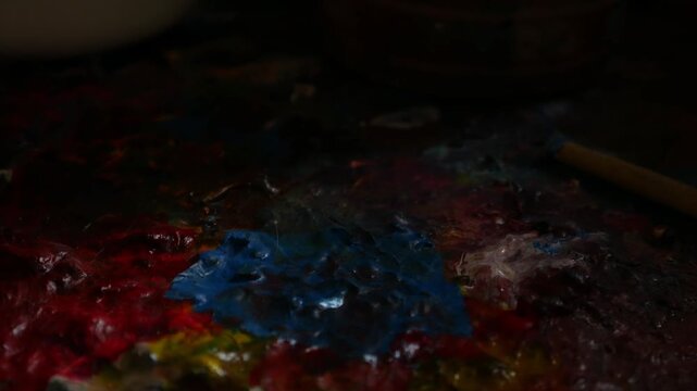 Artist Paintbrush on Colorful Acrylic Paint Palette Closeup, Creative Studio Art 