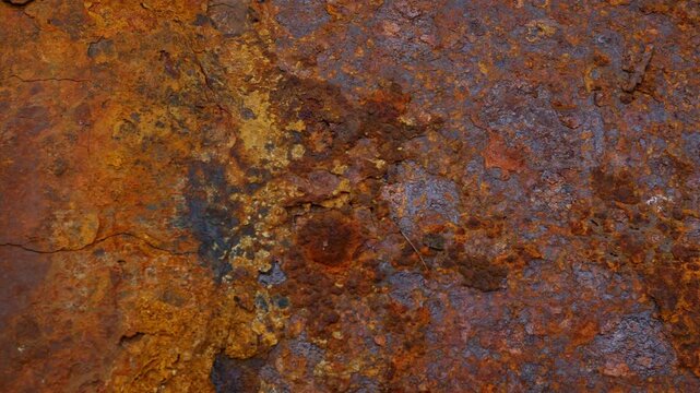 Rusty Metal Surface with Flaking Paint Chips Close Up Texture Background