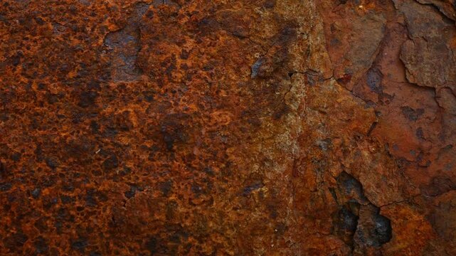 Rusty Metal Surface with Flaking Paint Chips Close Up Texture Background