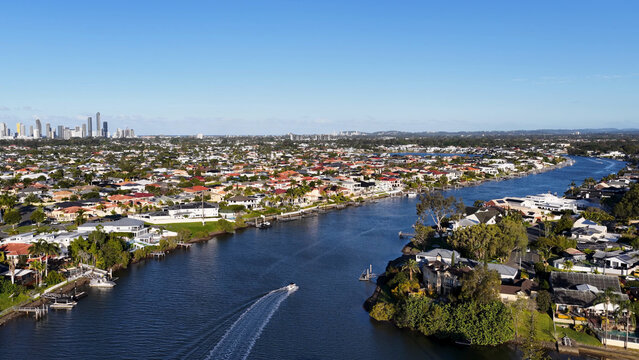 Aerial View of Luxury Waterfront Houses and Boat on Gold Coast Canal