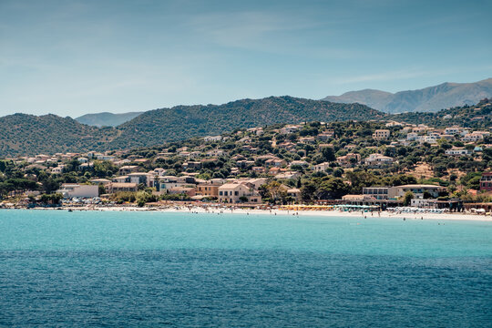 White sand beach of Ile-Rousse to enjoy the sun in Corsica