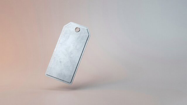 Blank metal price tag label floating in mid air on pastel background with against soft pastel blank metallic insert text copy space discount