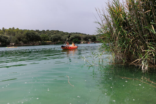 Kayakers enjoying outdoor water sport activity