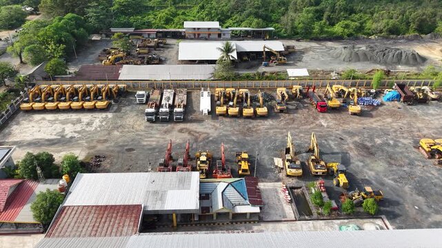 Excavator sales or rental places, many excavators are parked in a row to be shown off