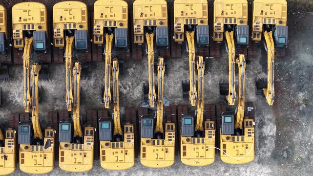 Excavator sales or rental places, many excavators are parked in a row to be shown off