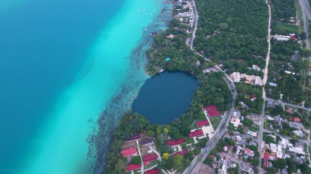 Scenic drone perspective of Bacalar Lagoon exposing colorful cenotes