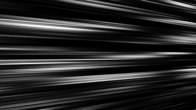 Black and white anime speedlines moving right on black background seamless loop