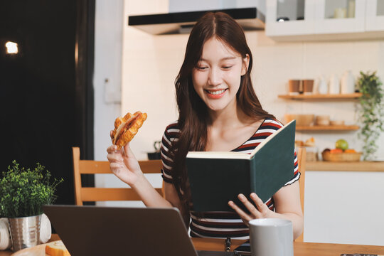 Asian woman using computer remote for business studying, watching online virtual webinar training meeting, video call. asian business woman talking on laptop in home office. Banner, copy space