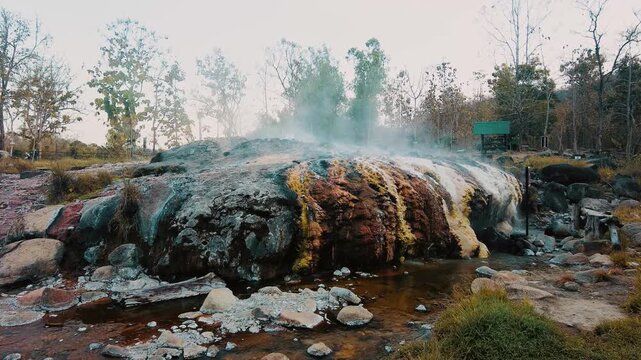 huge boulder in hotspring boiling water source muang rae hotspring in pai thailand static shot