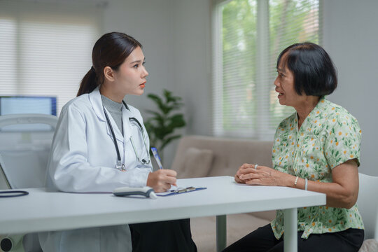 Doctor consulting senior patient about geriatric healthcare