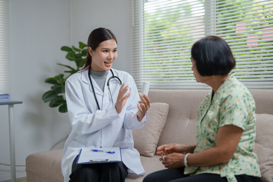 Young doctor explaining medicine to senior patient
