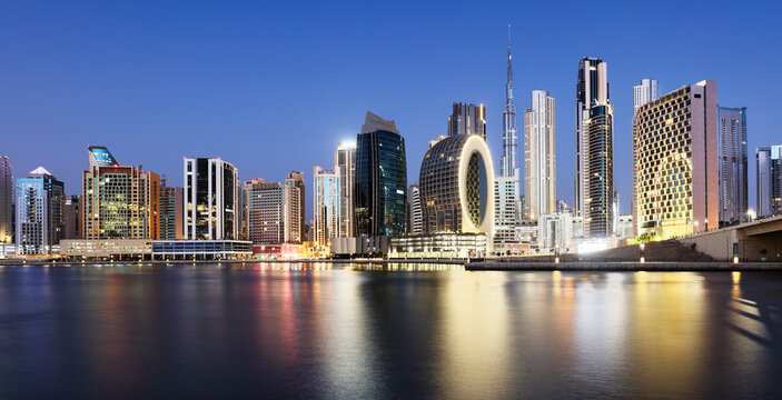 Dubai skyline with skyscraper and reflection in canal - nice cityscape in United Arab Emirates
