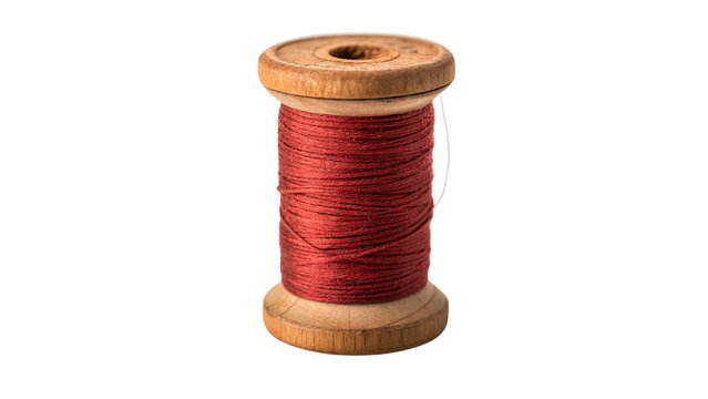 Vintage wooden sewing thread spool bobbin with red fiber isolated on transparent background