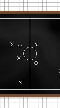 Animation of football game strategy drawn on black chalkboard against squared lined paper background
