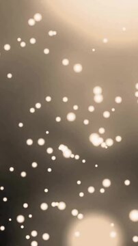 Animation of light spots on black background