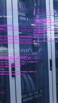 Computer code animation over server racks in data center