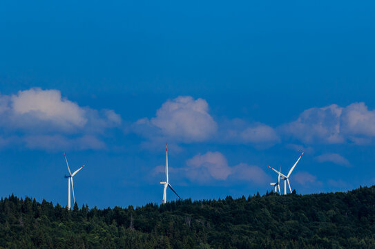 Wind turbines among the Carpathian Mountains. Ecological energy concept in Ukraine