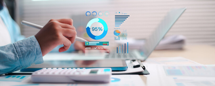 Business professional analyzing digital analytics dashboard on laptop, showing data visualization, performance metrics, financial insights, statistics, growth trends, and strategic decision making.