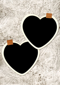 Two heart-shaped frame photos with adhesive tape pieces on old paper texture. Pictures album grid for scrapbooking. Vintage style mood board layout. Copy space for your text and photo