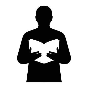 Black silhouette of man reading open book in hands isolated on transparent grid background