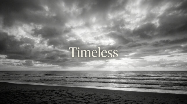 Timeless text on black and white ocean sunset, dramatic cloudy sky over sea horizon, monochrome coastal landscape background