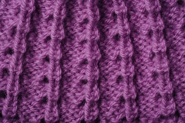 Fototapeta premium Purple knitted fabric with openwork pattern texture