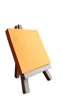 Yellow sticky post note paper on a stand isolated transparent background png.