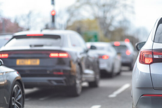 Traffic jam congestion with rows of cars on highway in rush hour