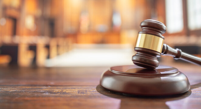 Judges gavel in courtroom justice, legal trial and law background