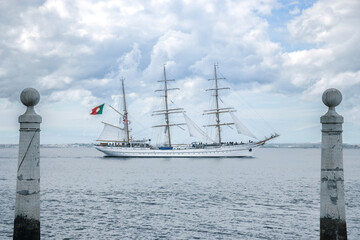 Tall Ship NRP Sagres Framed by Cais das Colunas Pillars in Lisbon Tagus River © Ci.Exp