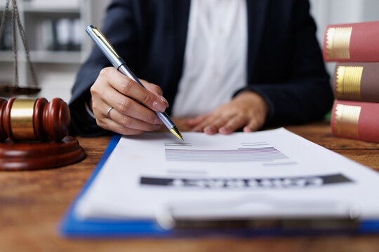 Legal law, advice and justice concept,Business lawyer working about legal legislation in courtroom to help their customer.