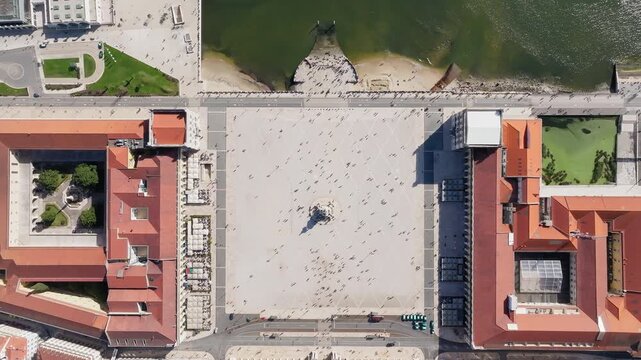 Overhead aerial view of Praca do Comercio and Rua Augusta Arch in Lisbon Baixa on Tagus River