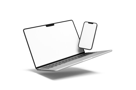 Floating laptop and smartphone mockup with blank white screens isolated on transparent background.