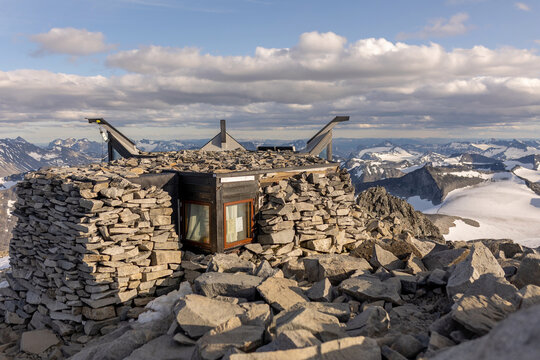 Galdhoppigen, 2469 m, the highest mountain peak in Norway on a beautiful sunny summer day, sunset, snow