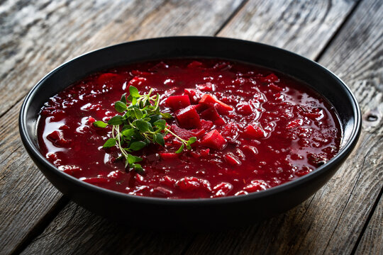 Ukrainian borscht on wooden table
