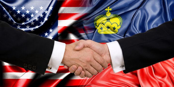 Handshake between the United States and Liechtenstein, international friendship, background with flags. Flags.