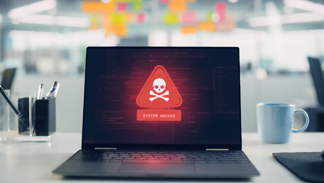 Office Laptop Suffers Hacking Cyberattack and Security Alerts, Malware Infection, Ransomware Risk, and Data Theft. System Compromise Warnings on Screen, Cybersecurity Danger for Business Networks.