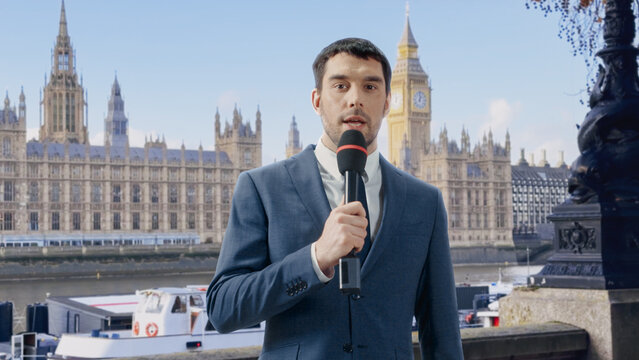 White Male Tv Journalist Delivers a Live News, Speaking into Microphone. Anchorman Reports Breaking Developments, Government Updates, Headline Analysis. Realistic Mock-up Screen Replacement