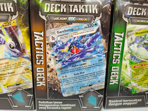 Malang, Indonesia - July 24, 2026: Indonesian Pok&eacute;mon Scarlet and Violet "Deck Taktik" box displaying Garchomp ex cards.
