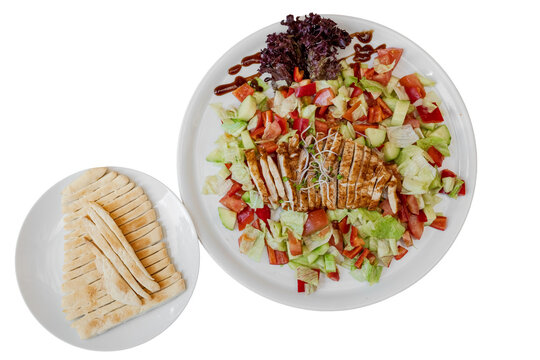Grilled chicken salad and flatbread refreshing healthy lunch