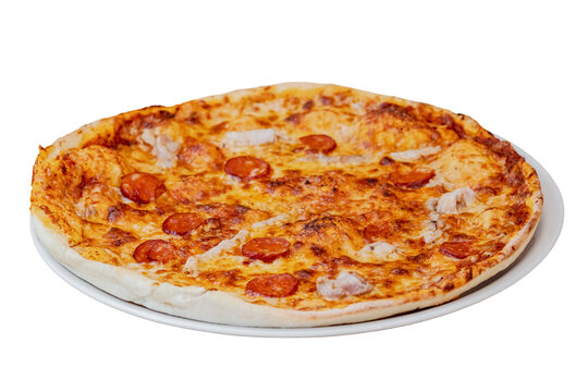 Delicious meat pizza with pepperoni and chicken on plate