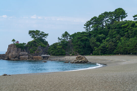 View of Kaizumi Shrine (Ryuo Shrine) perched on Ryuzu Cape at Katsurahama in Kochi, Japan.