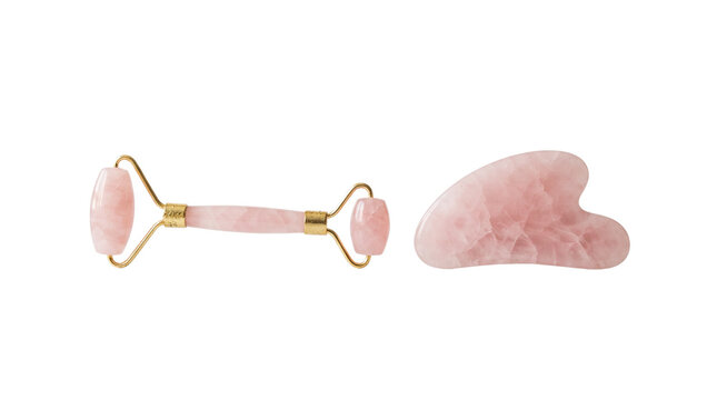 Pink rose quartz facial roller and gua sha stone set, natural crystal skincare tools, beauty massage kit on white background