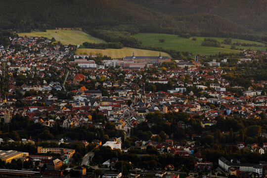 Aerial cityscape of Saalfeld town center with historic architecture at golden hour