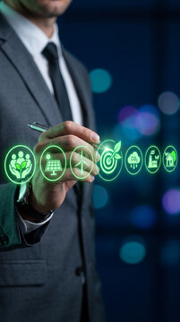 Man in suit touching holographic icons representing sustainability and business goals, symbolizing future eco-friendly corporate strategy and innovation