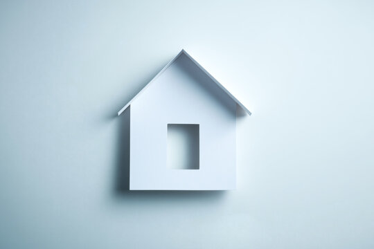 Minimalist Paper Cut Icon of Simple House