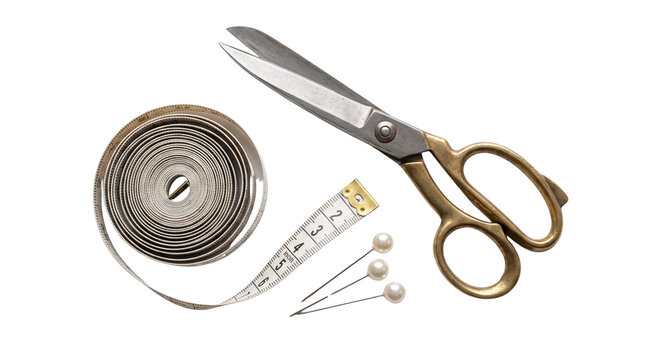 Vintage brass tailor scissors with sewing tools, professional dressmaker shears and measuring tape, sewing kit on white background